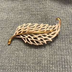 Vintage Monet white enamel and gold pin brooch